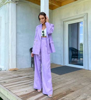 model wearing the suit in purple