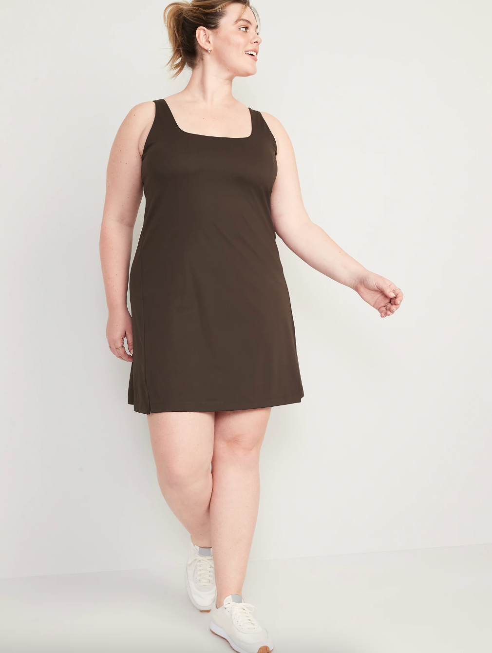 model wearing the square neck dress in brown