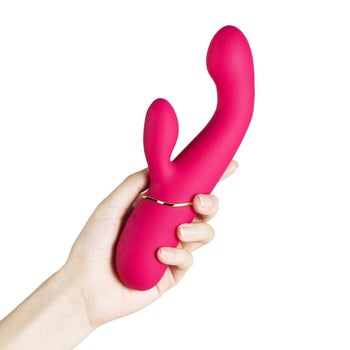Hand holding pink rabbit vibrator