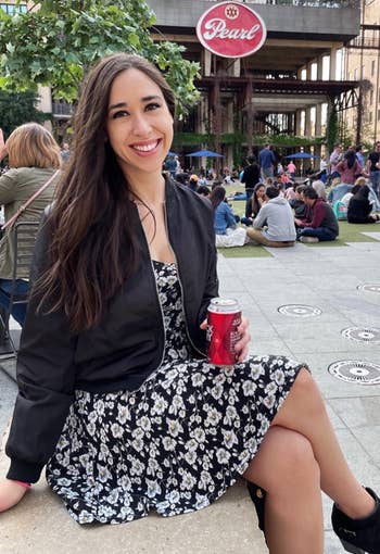 A reviewer in a black zip up jacket
