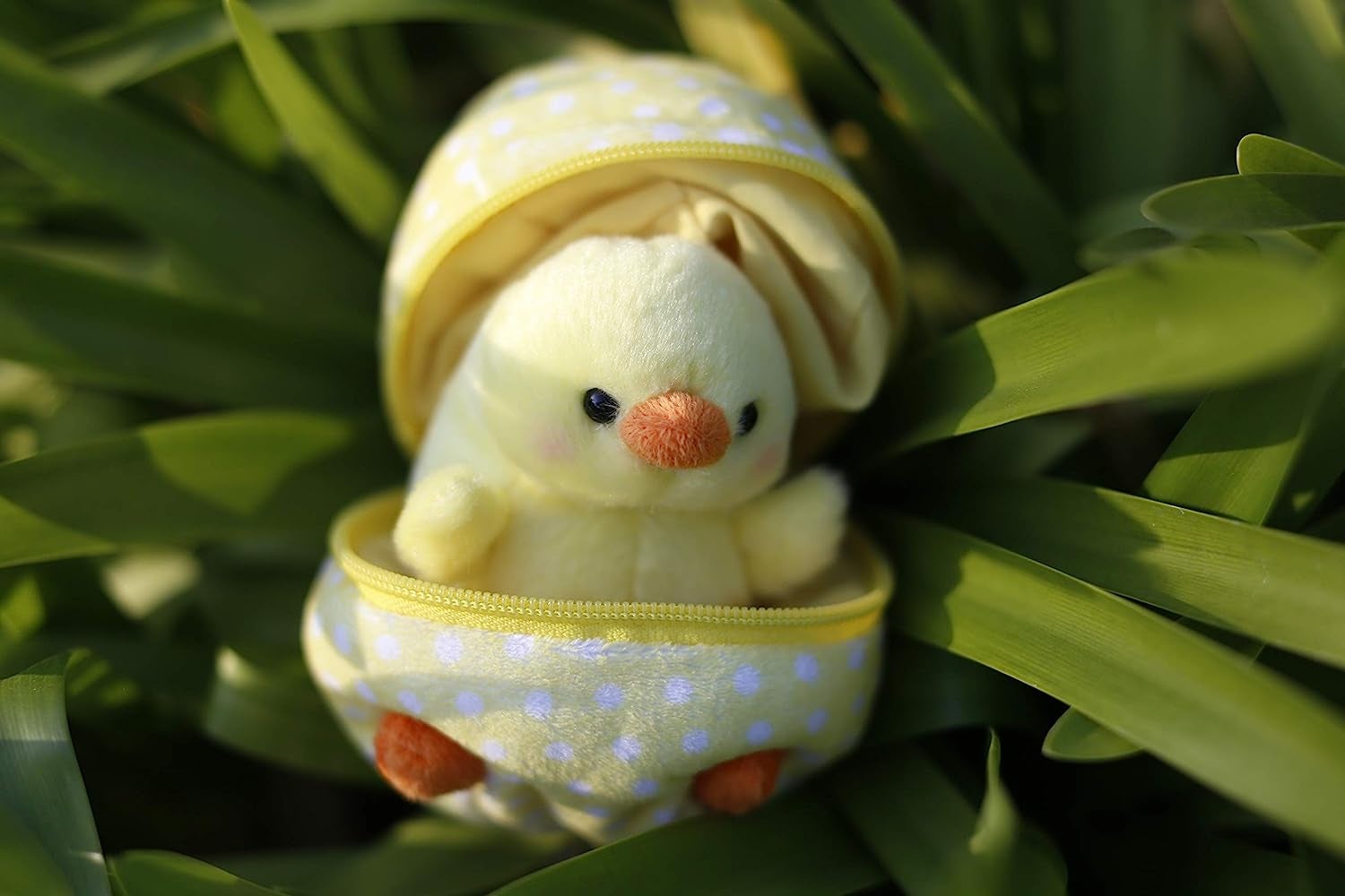 chic plush doll in grass