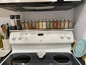reviewer photo of their fully stocked stove shelf