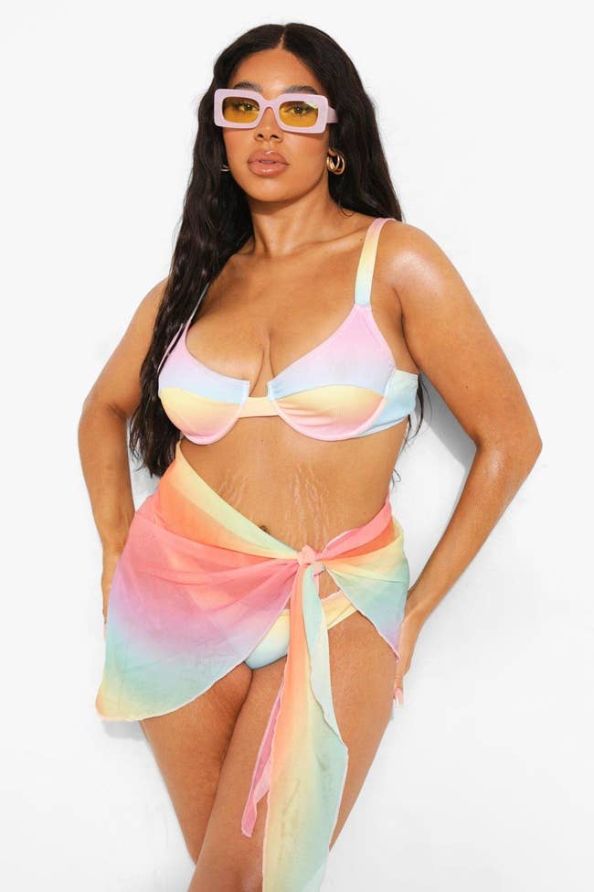 rainbow swimsuit with matching tied sarong