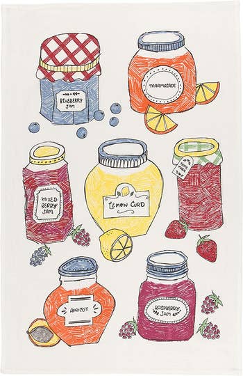 several jars of jam on a dishtowel 