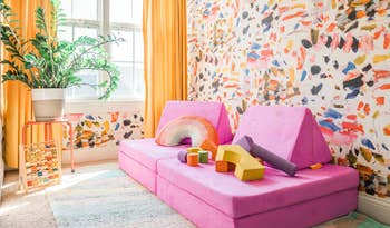 a bright pink nugget couch