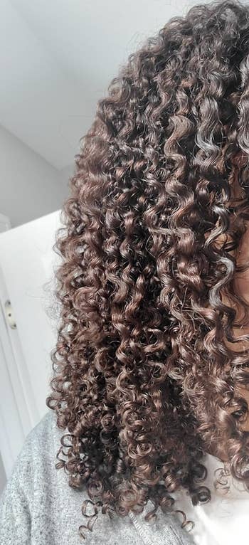 close up of reviewers defined, moisturized curls