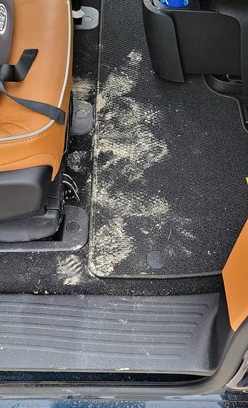 A reviewer's backseat floor full of sand