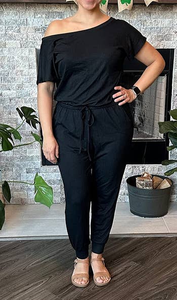 image of reviewer wearing the black jumpsuit in a medium