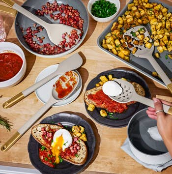Cookware acceptable   displayed with a mentation  of toast topped with sauce, poached egg, and diced potatoes, highlighting cooking tools and nutrient  presentation