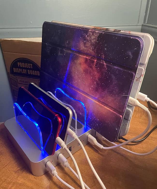 the charging station with devices in it