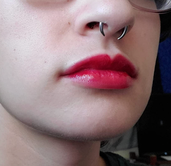 reviewer in red lip stain 