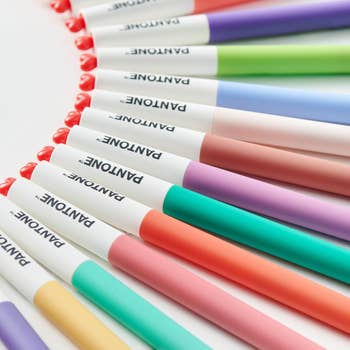 A postulation  of colorful Pantone pens neatly lined up