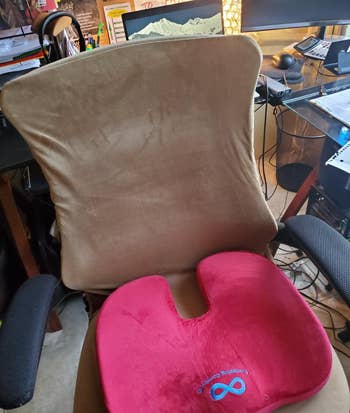 the red cushion on an office chair