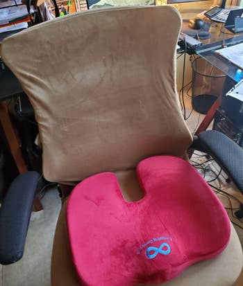 the red cushion on an office chair