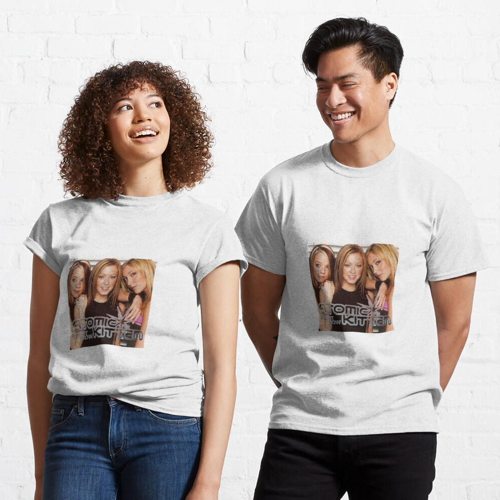 two model wearing the t-shirt with a photo of the atomic kittens and their group name printed on the front