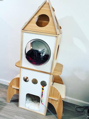 reviewer photo of the rocket-shaped cat condo