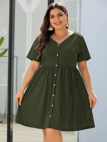 model wearing green dress with buttons