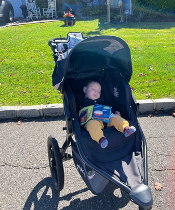 an editor's child in a bob revolution jogging stroller