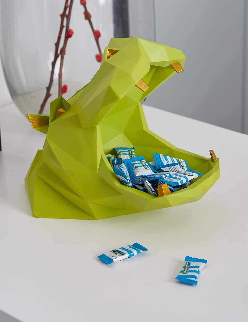hippo head dish with open mouth filled with treats