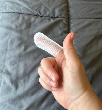 Hand with a digit hitch connected scale finger