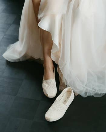 Wedding formal  with lace slip-on shoes shown close-up