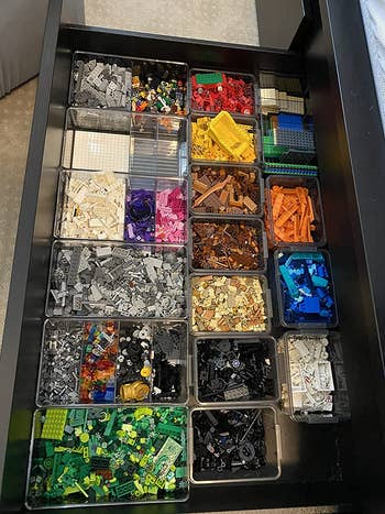 reviewer photo of drawer full of storage bins full of LEGOs