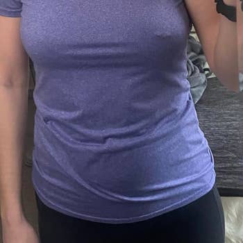 Reviewer in a casual t-shirt with one pierced nipple without pastie and other hidden under pastie