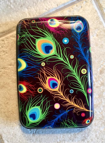 reviewer photo of peacock design aluminum wallet