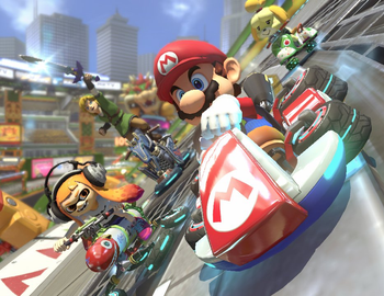 several characters including mario racing on a track