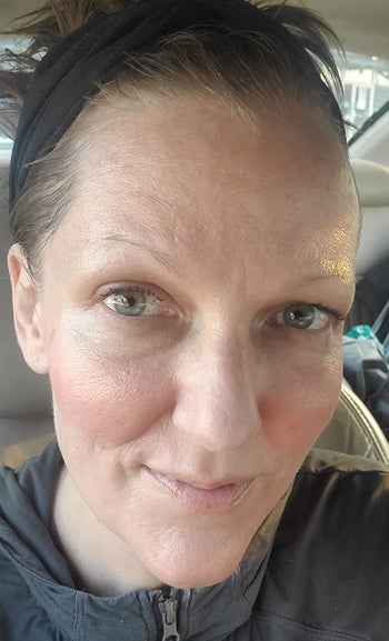 image of reviewer wearing sunscreen on their face