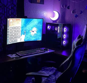 another reviewer's glowing moon lamp in a reviewer's darkened setup