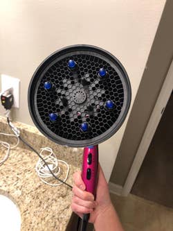 Reviewer's travel diffuser attached to a blowdryer, front view