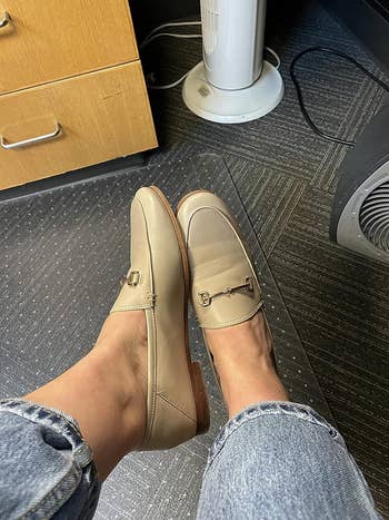 reviewer wearing the loafers in beige