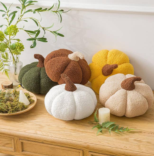 the pumpkin throw pillows in five colors
