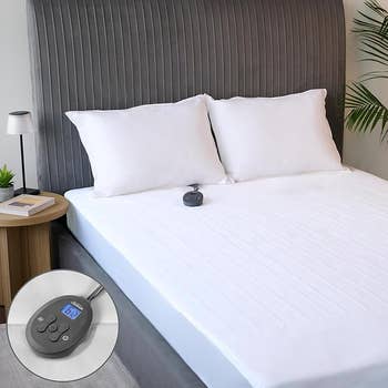 Bed with achromatic  sheets and 2  pillows, featuring an adjustable slumber  tracker distant    connected  top. Inset shows a close-up of the remote's screen