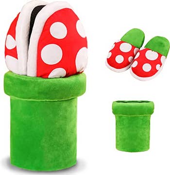 piranha plant slippers in a green plush tube like from the mario games