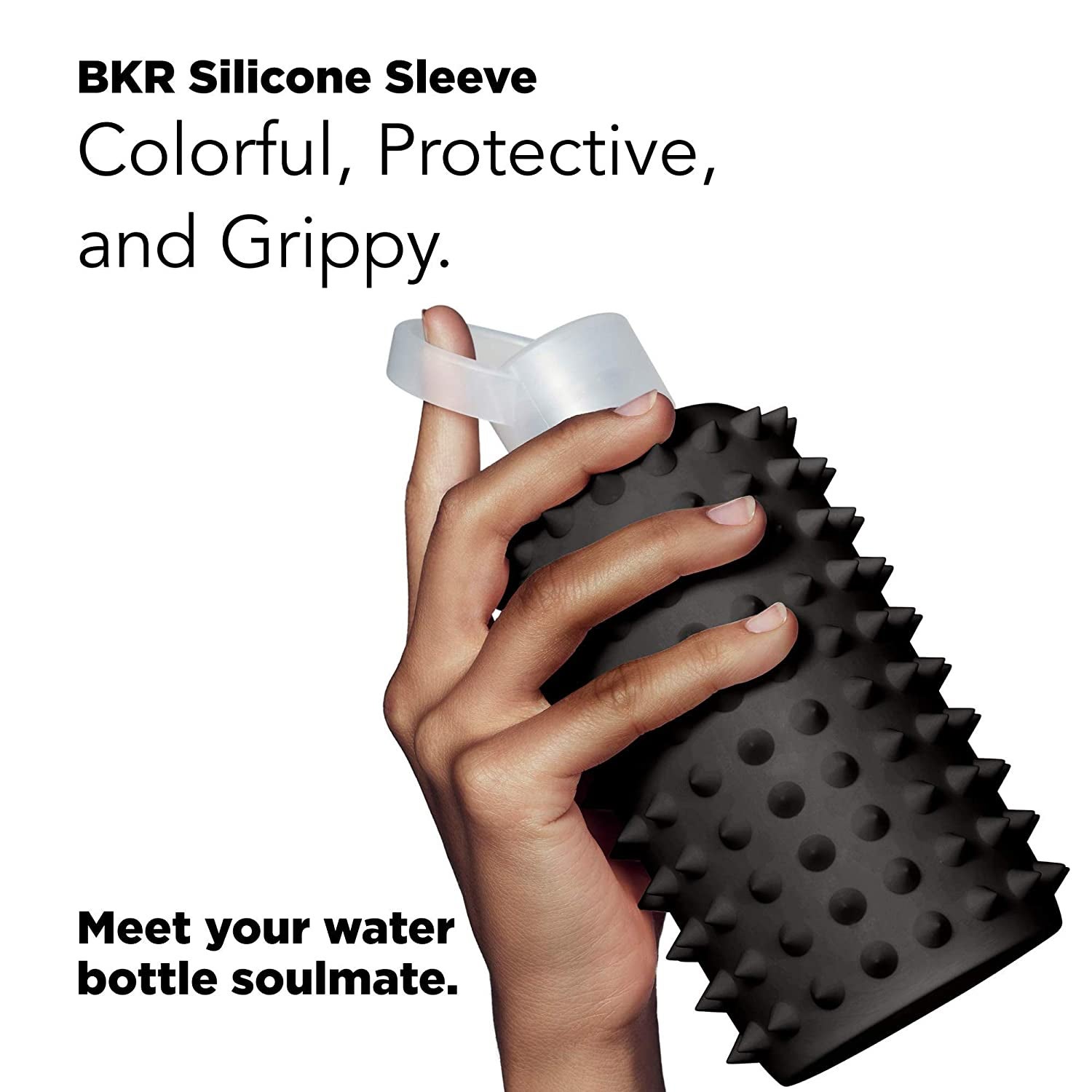 hand gripping a water bottle covered in a silicone sleeve with spikes on it