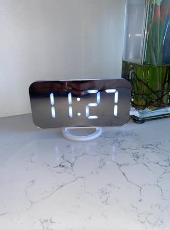 the alarm clock on a reviewer's counter 