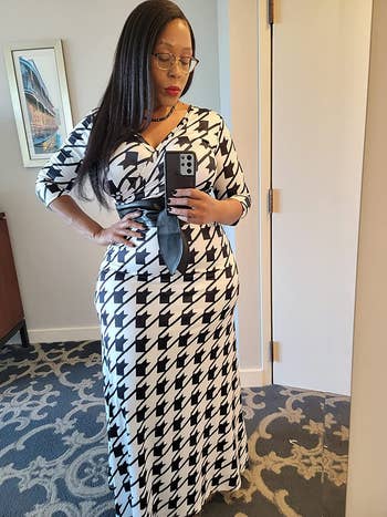 image of reviewer wearing the houndstooth maxi dress