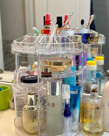 another reviewer's clear rotating organizer with various products on it