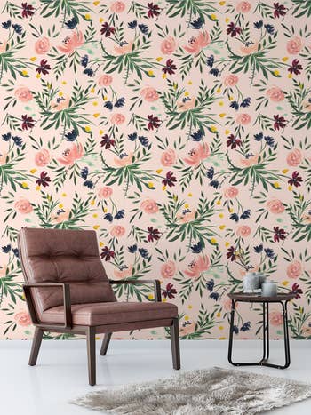 the pink floral wallpaper in a living space