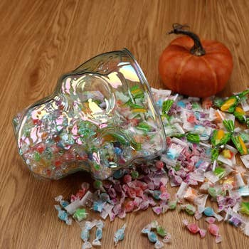the skull bucket dipped over with candy spilling out