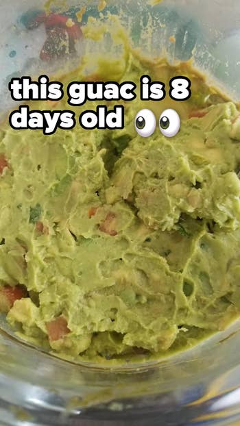 Guacamole in a bowl with text overlay saying “this guac is 8 days old” and eye emoji
