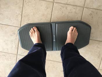 reviewer using the balance board