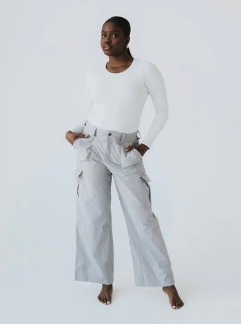 Model wearing the grey cargo pants
