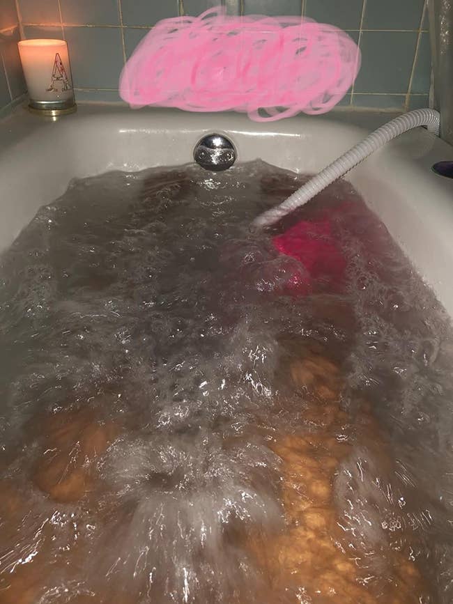 photo of a tub with the jets on and you can see the bubbles its producing