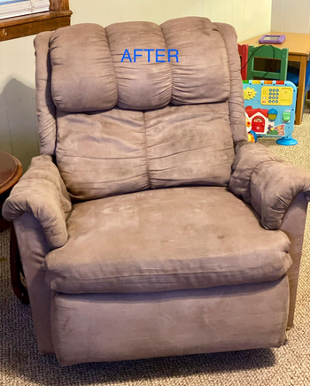 the same recliner with all the stains removed and the fabric looks clean again