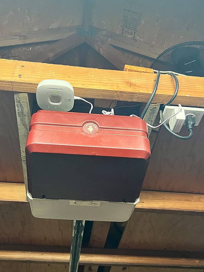 MyQ system on top of a reviewer's garage door opening system