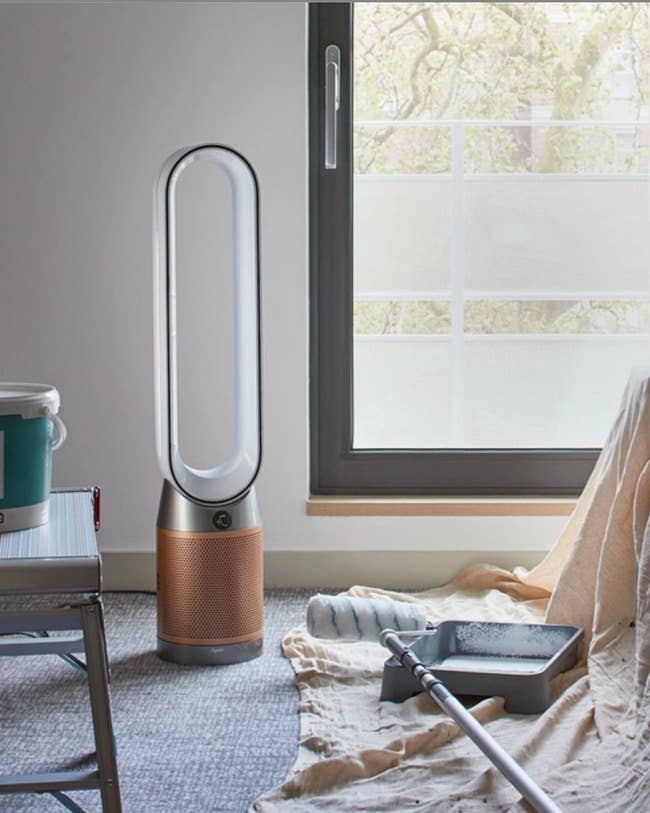 Dyson air purifier in room next to painting materials