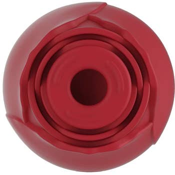 Red silicone microwave popcorn popper with foldable plan and halfway opening. Ideal for health-conscious snacking and compact storage